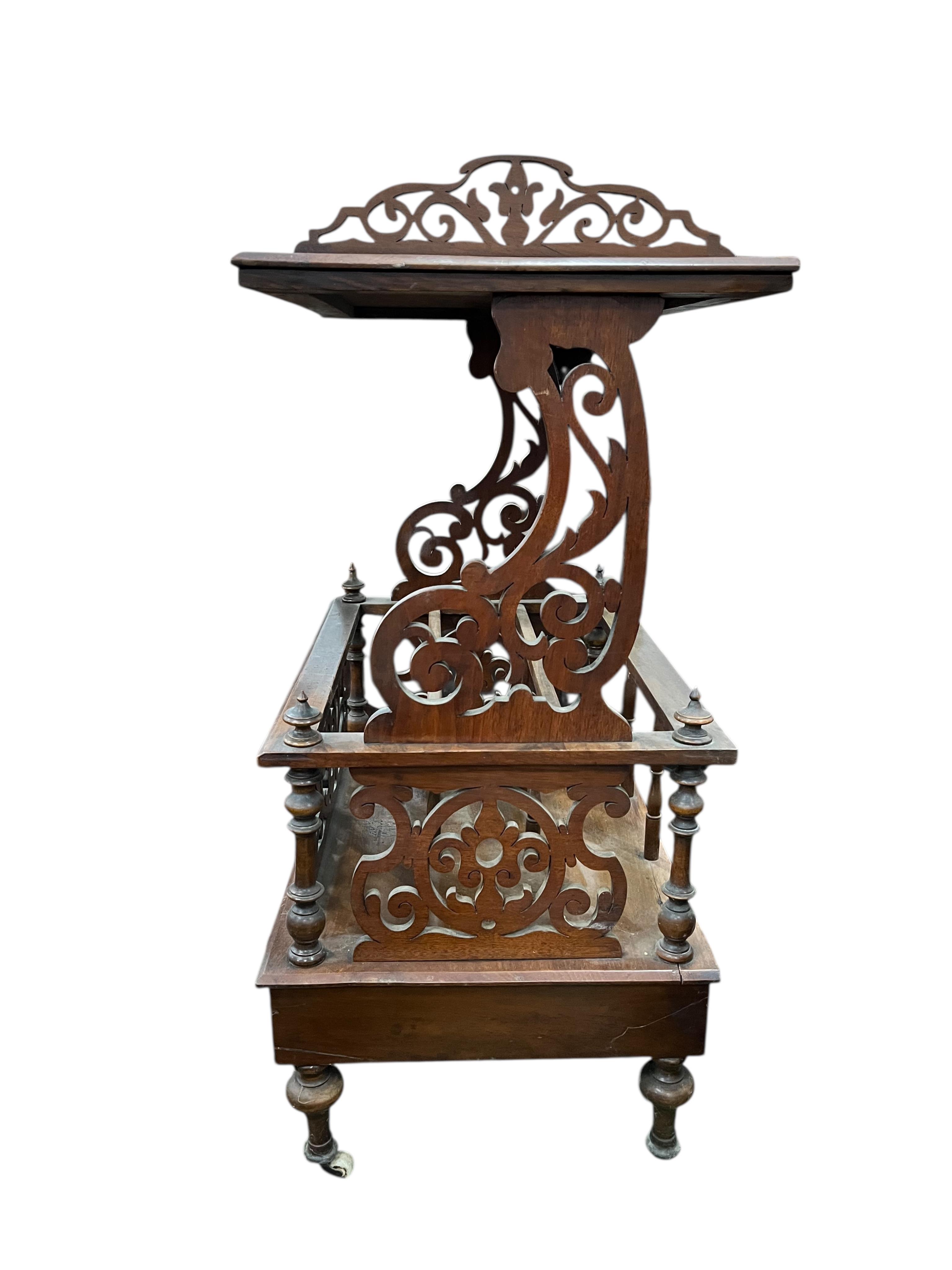 A Victorian inlaid walnut music Canterbury, width 56cm, depth 40cm, height 89cm